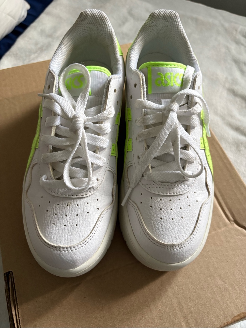 ASICS woman’s White Sneakers with Neon Green Accents
